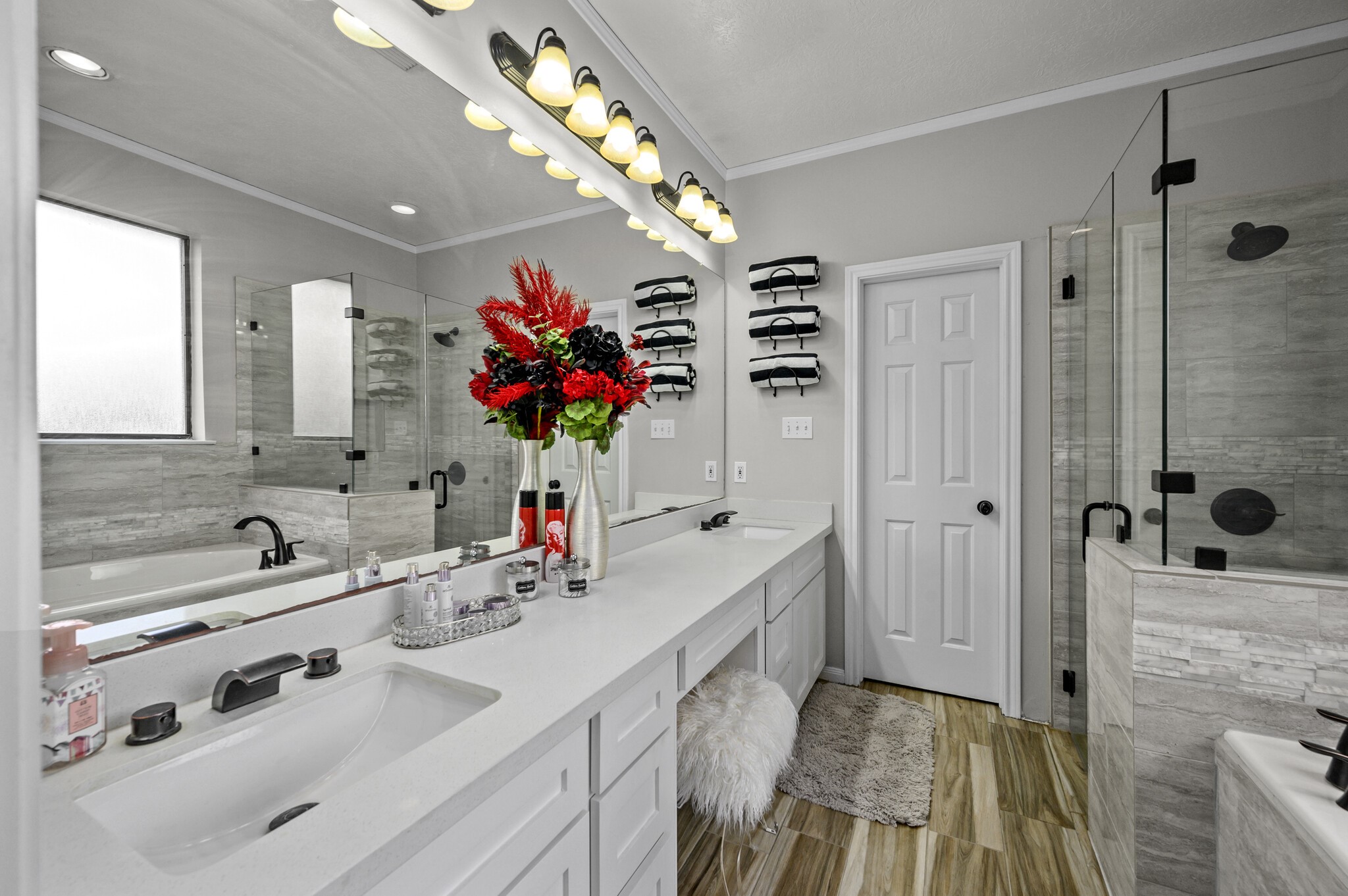 12302 Fisher Drive Mont Belvieu, TX 77523 - Photo 17 of 23 a bathroom with a sink double vanity and a mirror