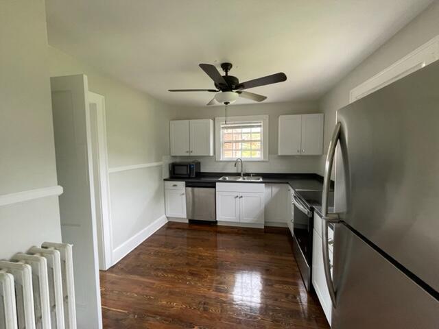 3607 Cove Road Roanoke, VA 24017 - Photo 2 of 9 a kitchen with a refrigerator and a sink
