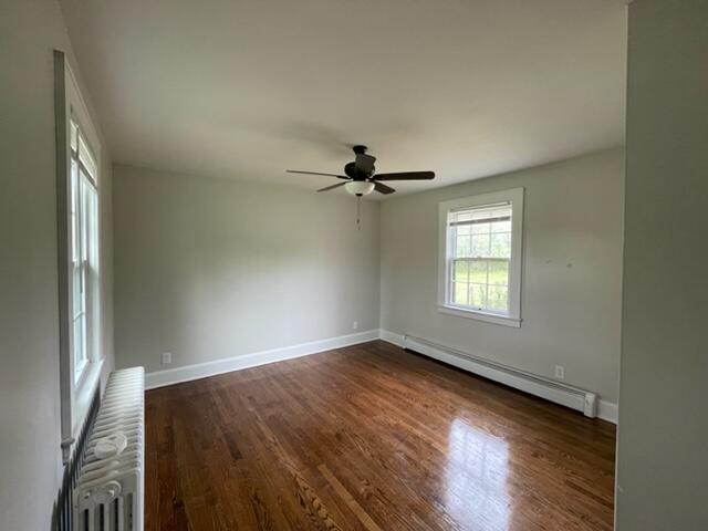 3607 Cove Road Roanoke, VA 24017 - Photo 7 of 9 wooden floor in an empty room with a window