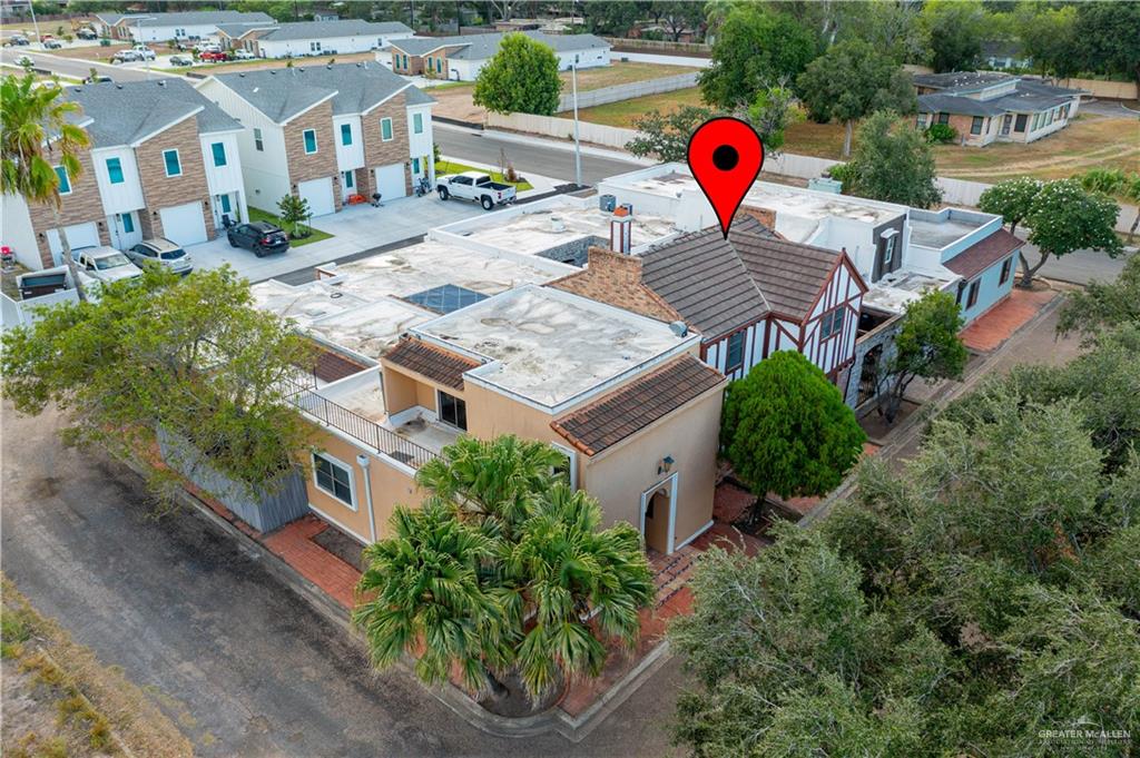 1004 South Border Avenue Weslaco, TX 78596 - Photo 19 of 20 an aerial view of a house with a backyard and a garden
