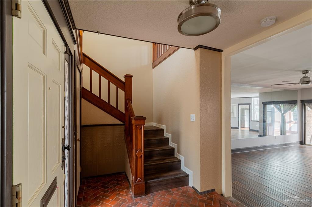 1004 South Border Avenue Weslaco, TX 78596 - Photo 5 of 20 a view of entryway and hall with wooden floor