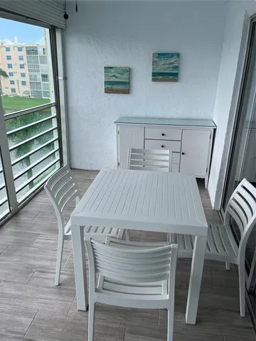 a view of a dining room with furniture