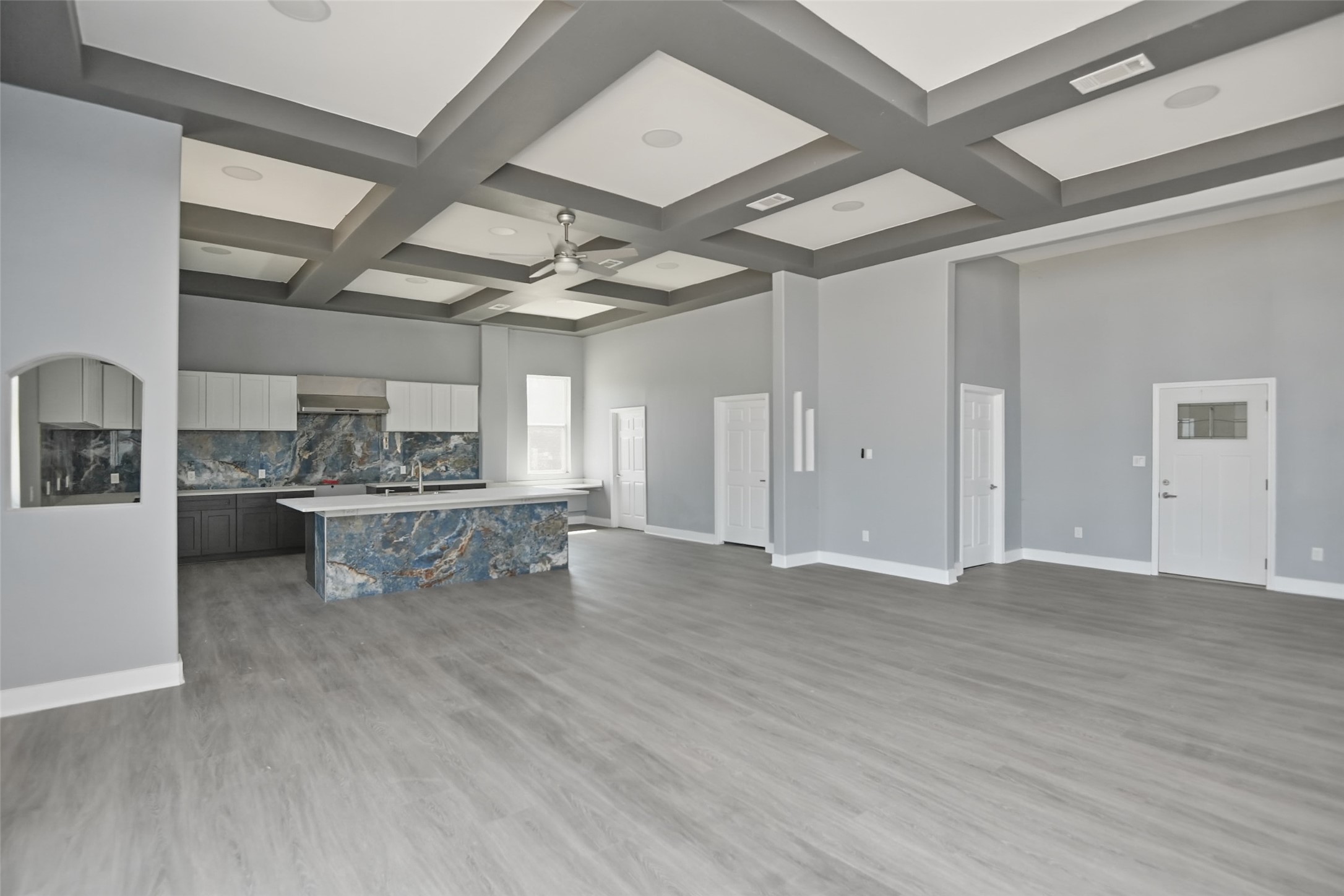 14300 Fallen Timber Drive Austin, TX 78734 - Photo 13 of 35 a view of a big room with wooden floor and windows
