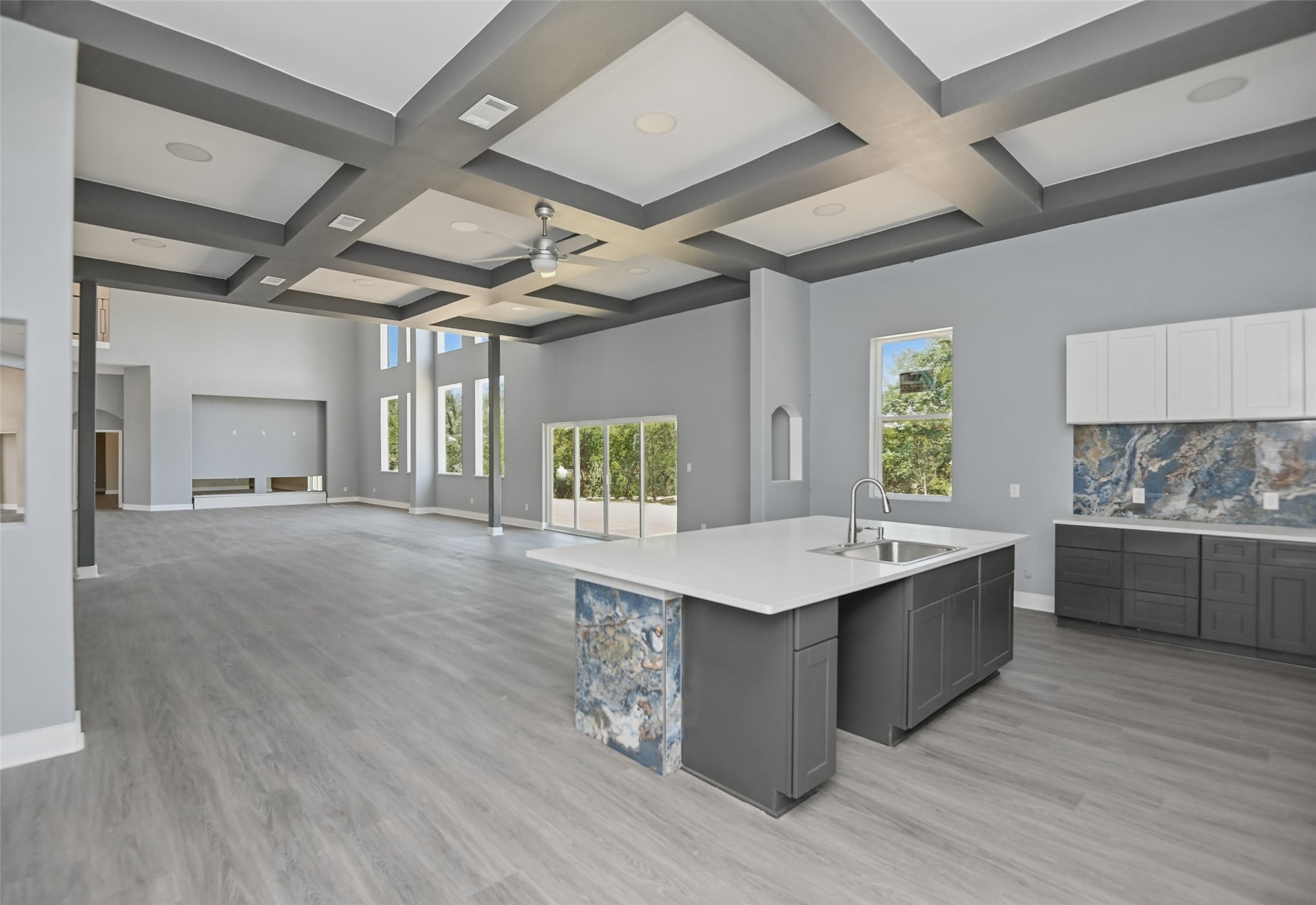 14300 Fallen Timber Drive Austin, TX 78734 - Photo 15 of 35 a large kitchen with stainless steel appliances granite countertop a lot of counter space and wooden floors