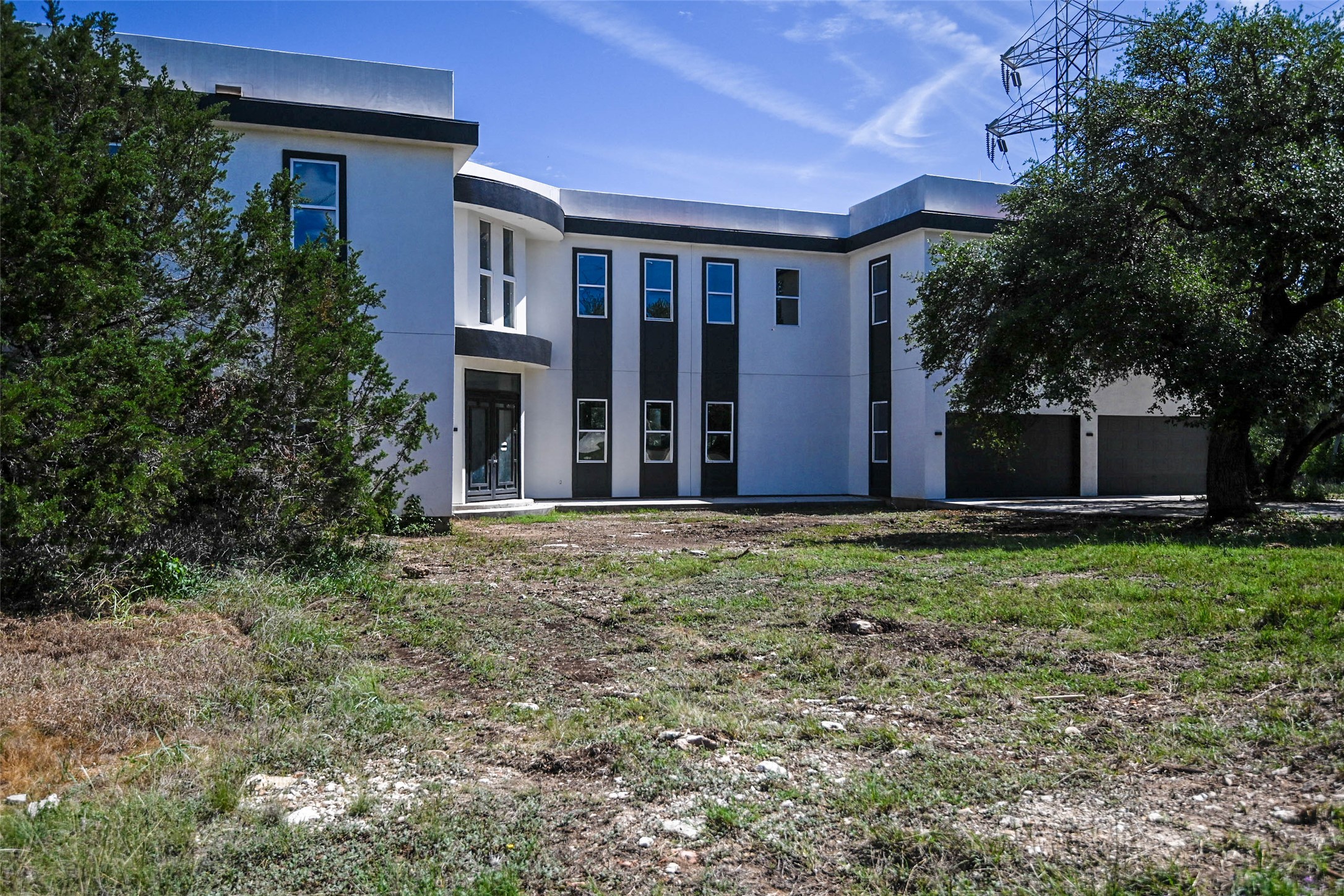 14300 Fallen Timber Drive Austin, TX 78734 - Photo 2 of 35 a view of house with front yard