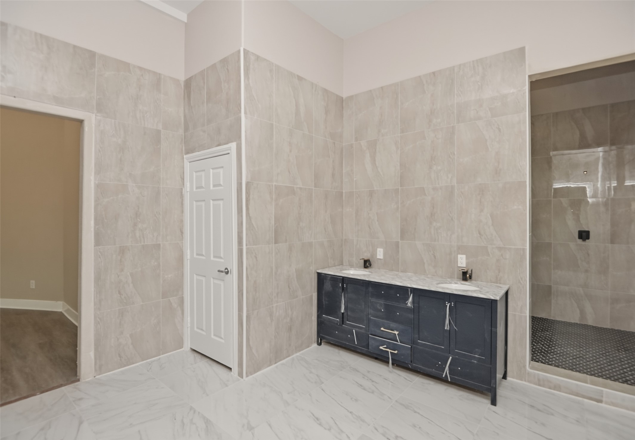 14300 Fallen Timber Drive Austin, TX 78734 - Photo 21 of 35 a spacious bathroom with a shower and a sink