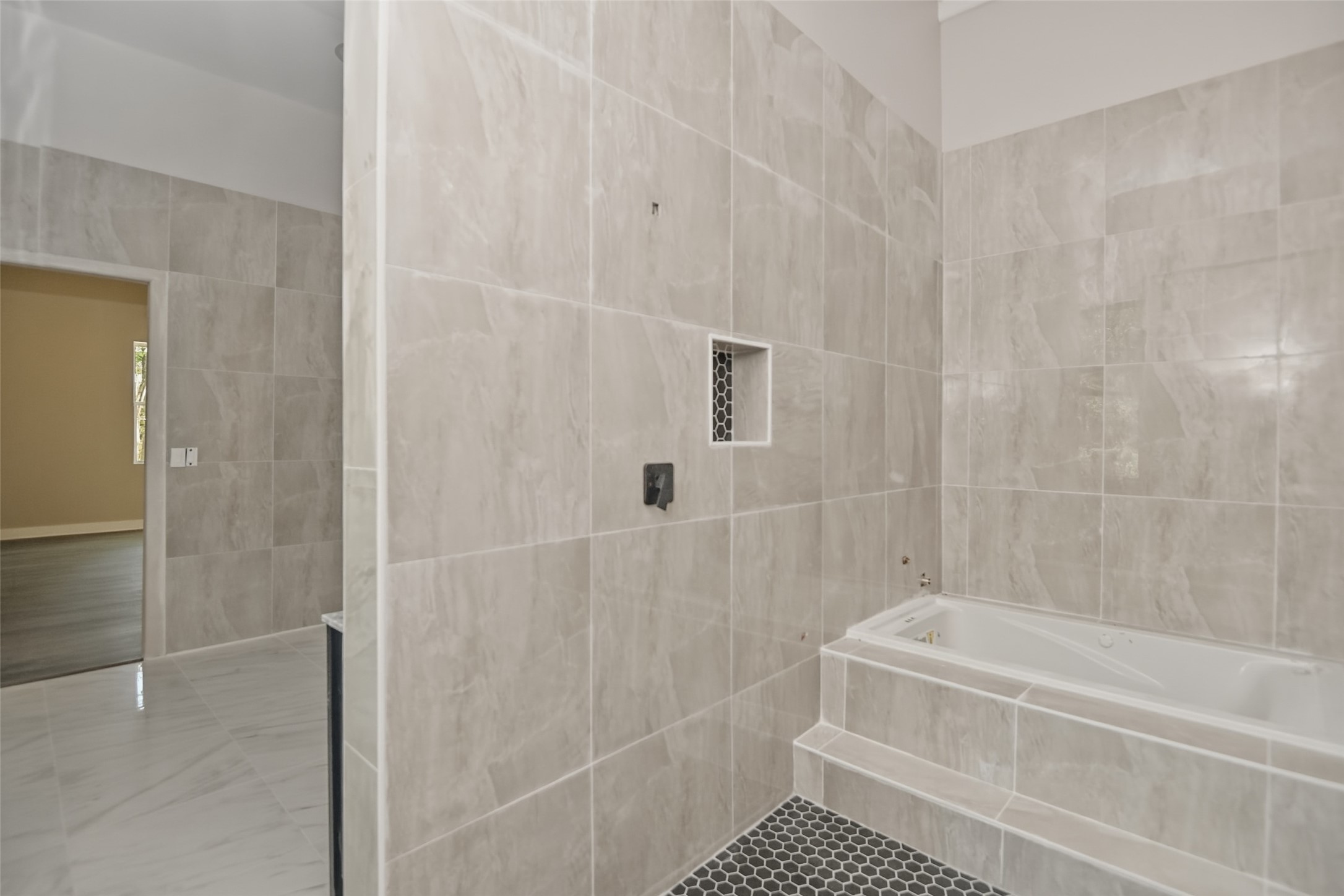 14300 Fallen Timber Drive Austin, TX 78734 - Photo 22 of 35 a bathroom with a shower