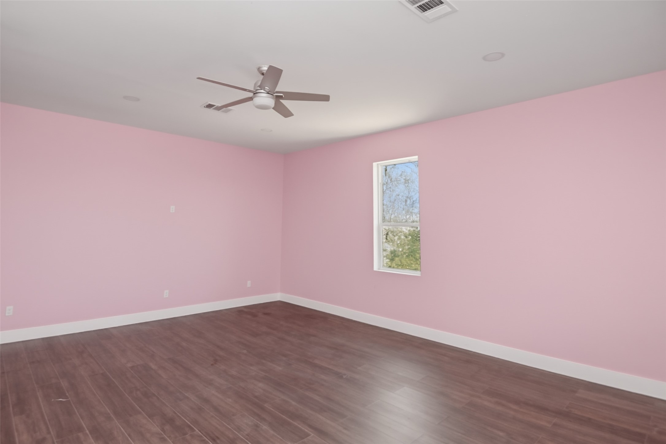 14300 Fallen Timber Drive Austin, TX 78734 - Photo 27 of 35 wooden floor in an empty room with a window