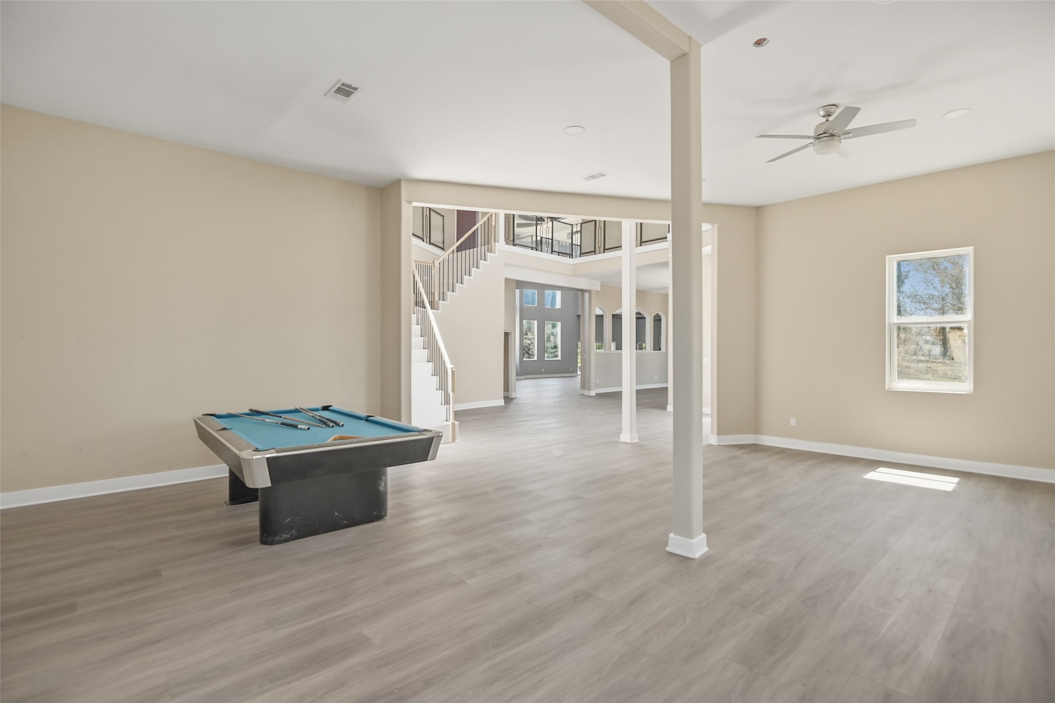 14300 Fallen Timber Drive Austin, TX 78734 - Photo 9 of 35 a view of a room with wooden floor