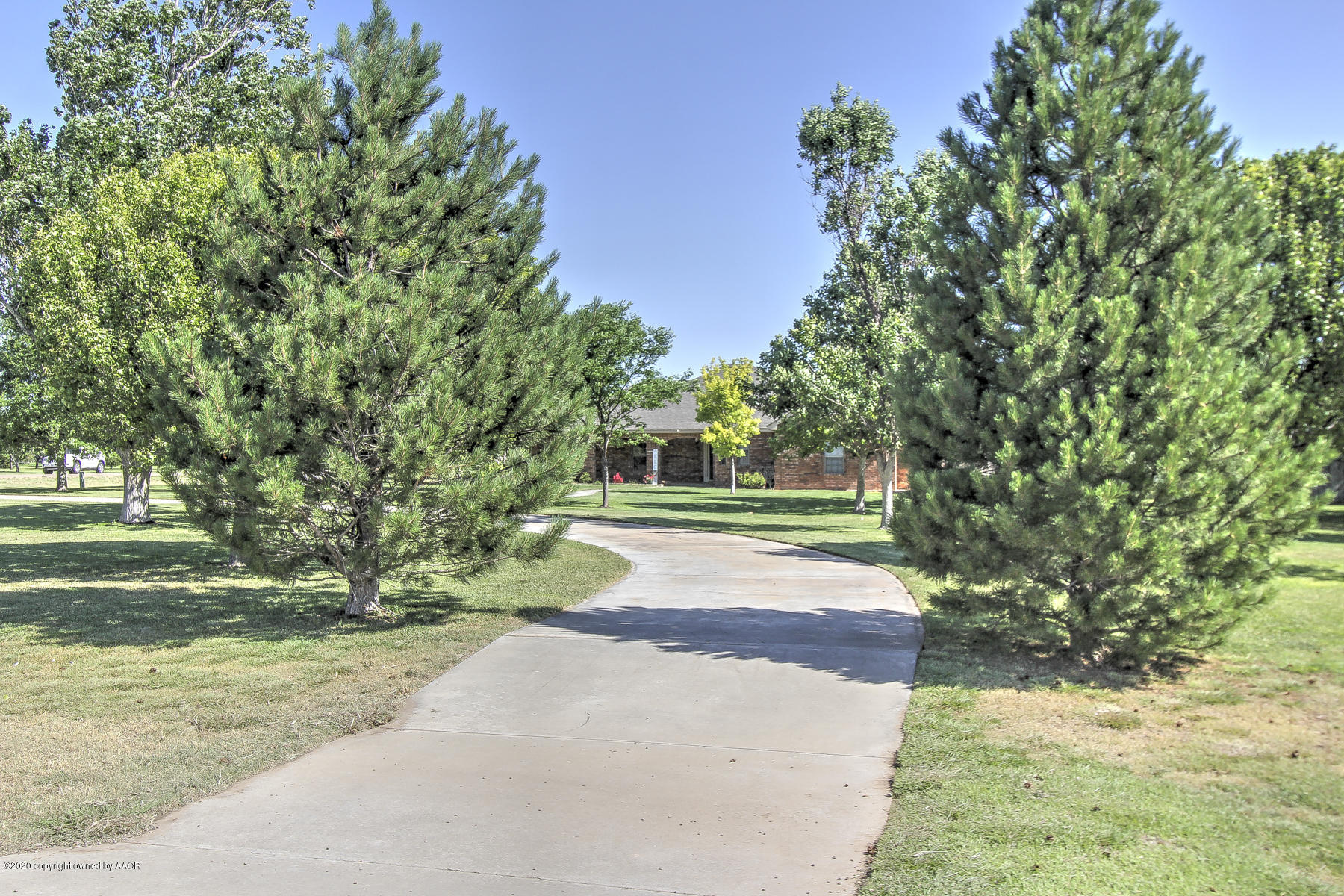 9000 Red Wing Road Amarillo, TX 79119 - Photo 2 of 33 a view of a house with a yard