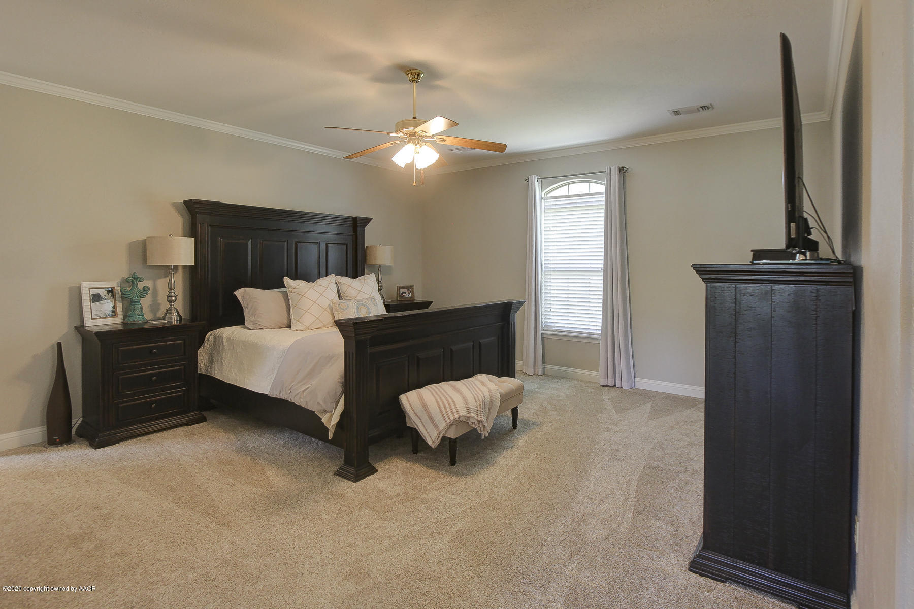 9000 Red Wing Road Amarillo, TX 79119 - Photo 24 of 33 a bedroom with bed and window