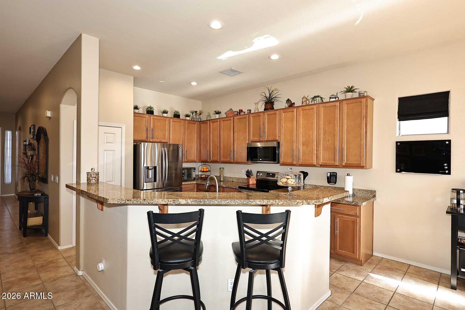 5507 West Carson Road Laveen, AZ 85339 - Photo 14 of 49 Kitchen-Island Bar