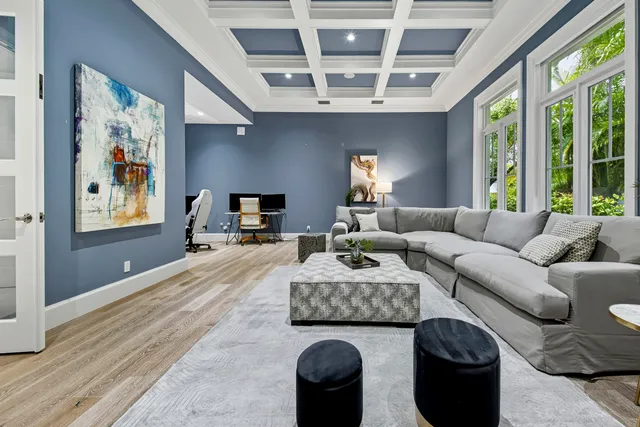 a bedroom with a large bed and a couch