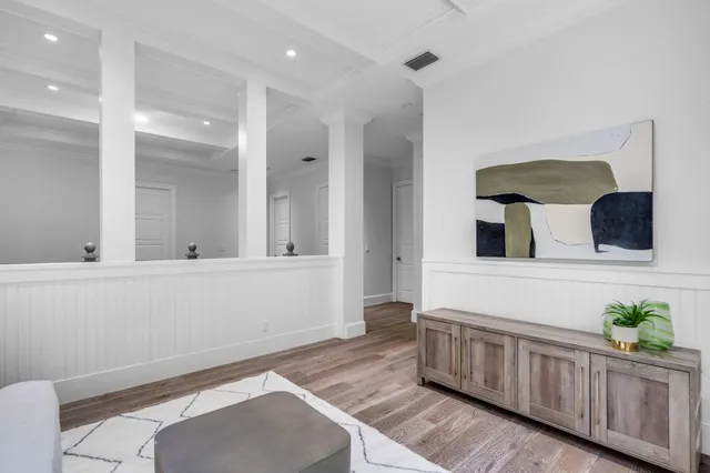 an aerial view of a house with a yard and a garden