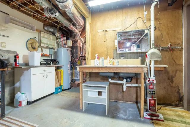 a view of green field with trees in the background