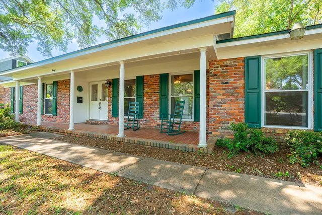 a view of a backyard with a garden