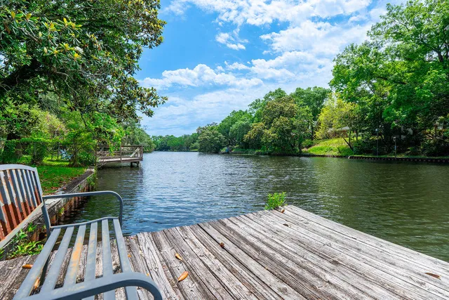 a wooden deck with lake view