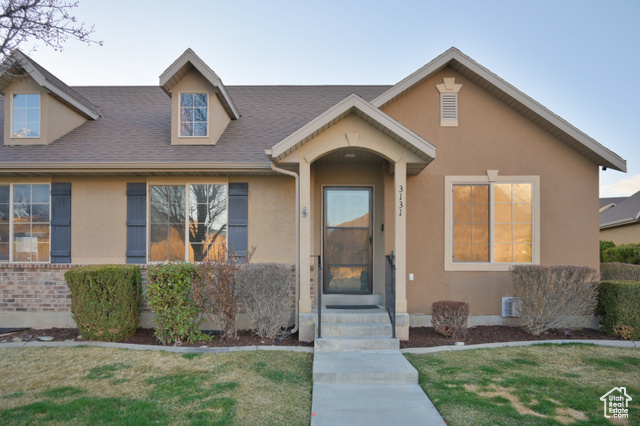 3131 East River Bottoms Road Spanish Fork, UT 84660 - Photo 1 of 1 View of front of home featuring a front lawn, stucco siding, and a shingled roof