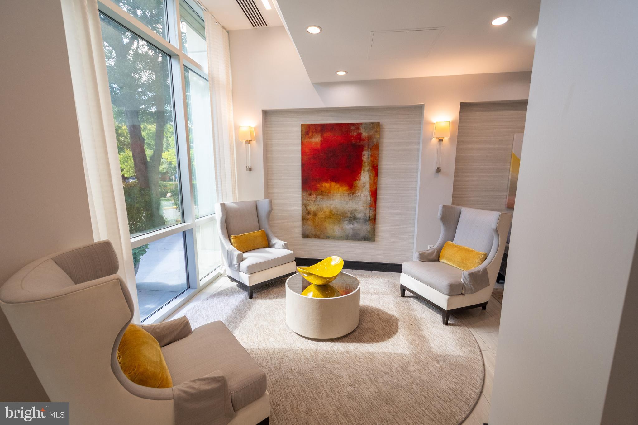 1225 Martha Custis Drive, Unit 502 Alexandria, VA 22302 - Photo 21 of 24 a living room with furniture and wooden floor