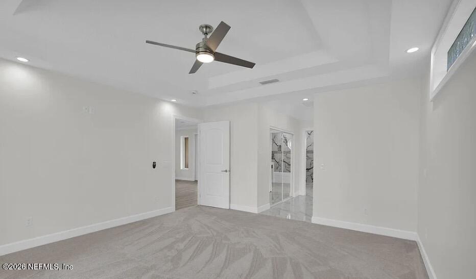 159 Mays Cove Road East Palatka, FL 32131 - Photo 17 of 49 an empty room with closet and windows