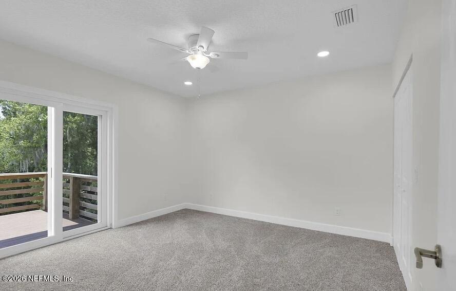 159 Mays Cove Road East Palatka, FL 32131 - Photo 31 of 49 an empty room with windows