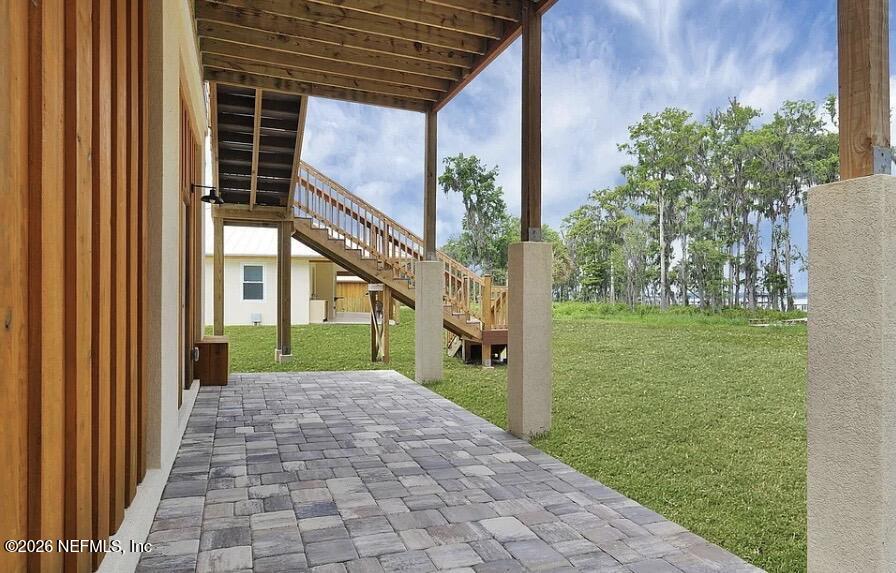 159 Mays Cove Road East Palatka, FL 32131 - Photo 38 of 49 a view of a house with a yard