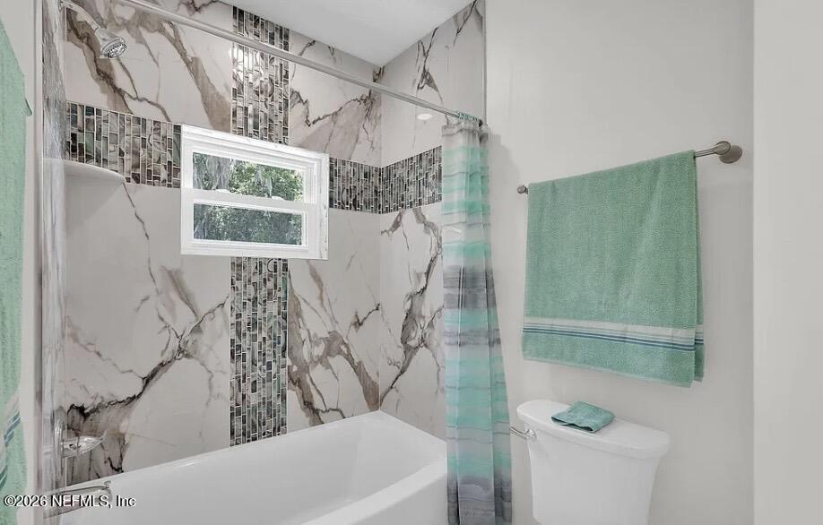 159 Mays Cove Road East Palatka, FL 32131 - Photo 43 of 49 a bathroom with a bathtub and shower