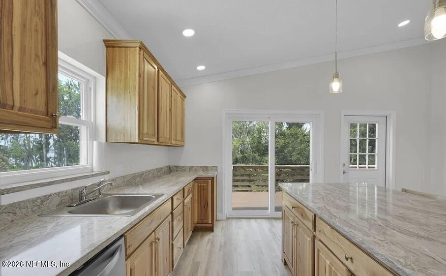 159 Mays Cove Road East Palatka, FL 32131 - Photo 45 of 49 a kitchen with granite countertop a sink a counter space appliances and windows