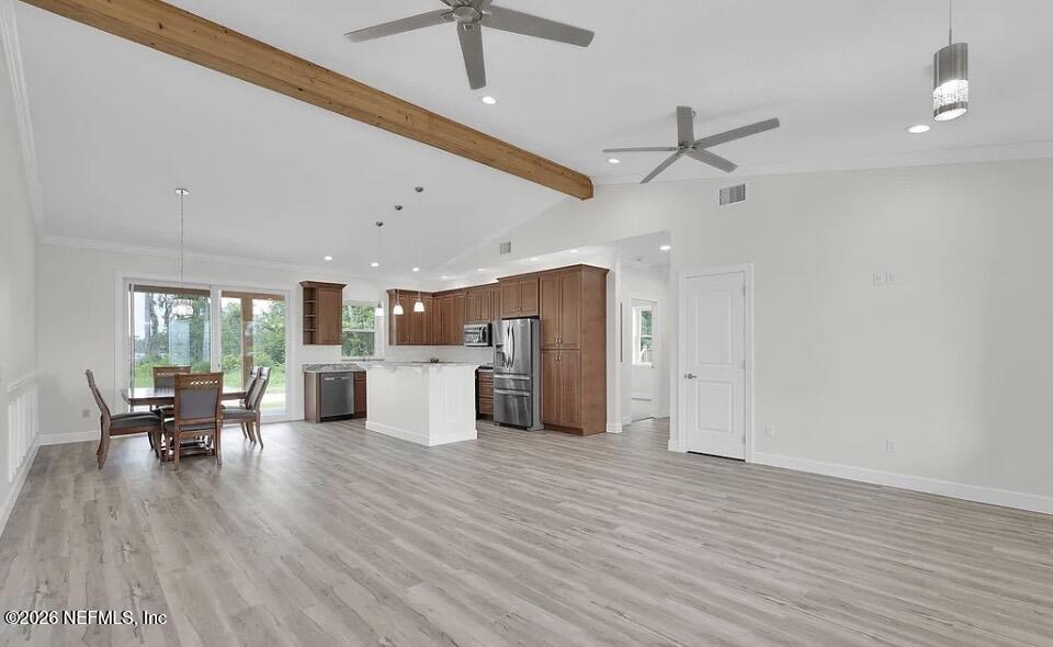 159 Mays Cove Road East Palatka, FL 32131 - Photo 6 of 49 a view of a livingroom with furniture and a ceiling fan