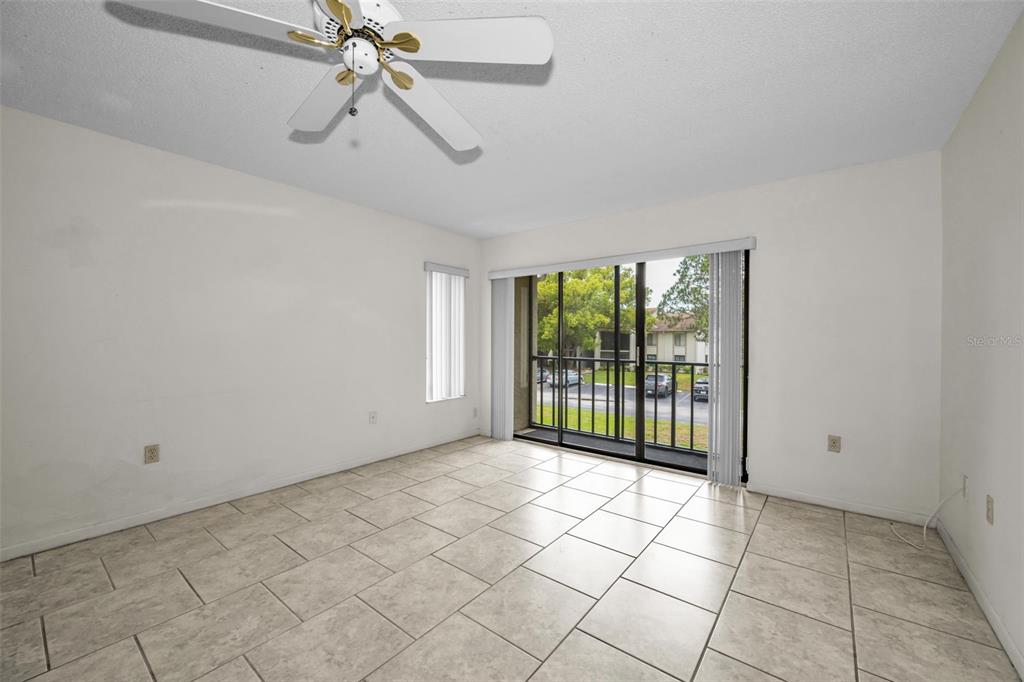 2687 Pine Ridge Way South, Unit B2 Palm Harbor, FL 34684 - Photo 8 of 68 a view of a room with windows