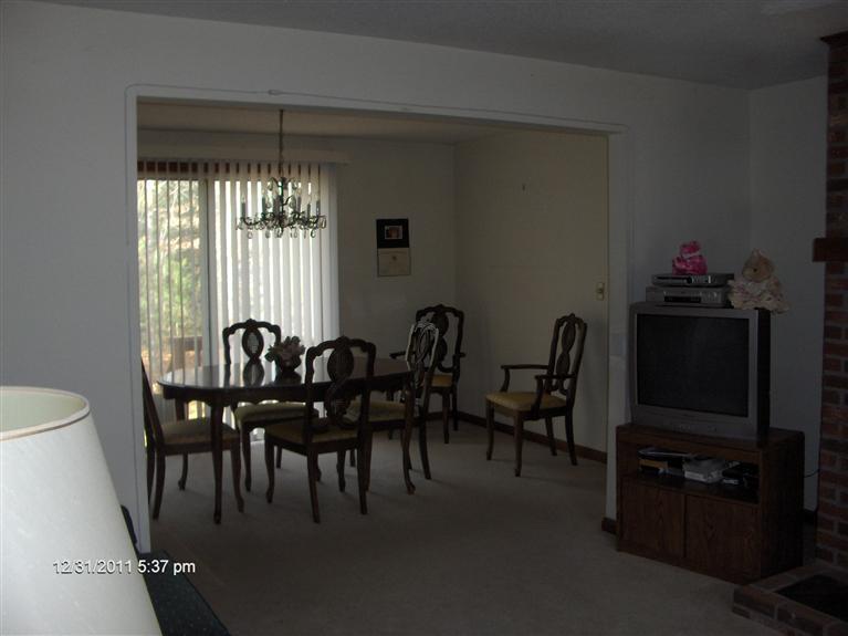 140 Cedric Road Centerville, MA 02632 - Photo 2 of 17 a view of a dining room with furniture and a window