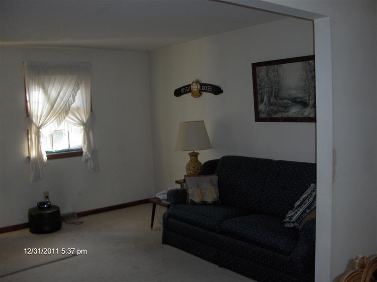 140 Cedric Road Centerville, MA 02632 - Photo 4 of 17 a living room with furniture and a window