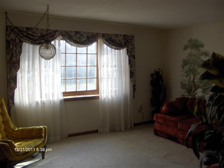140 Cedric Road Centerville, MA 02632 - Photo 7 of 17 a living room with furniture and a window