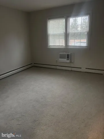 a view of a room that has a window