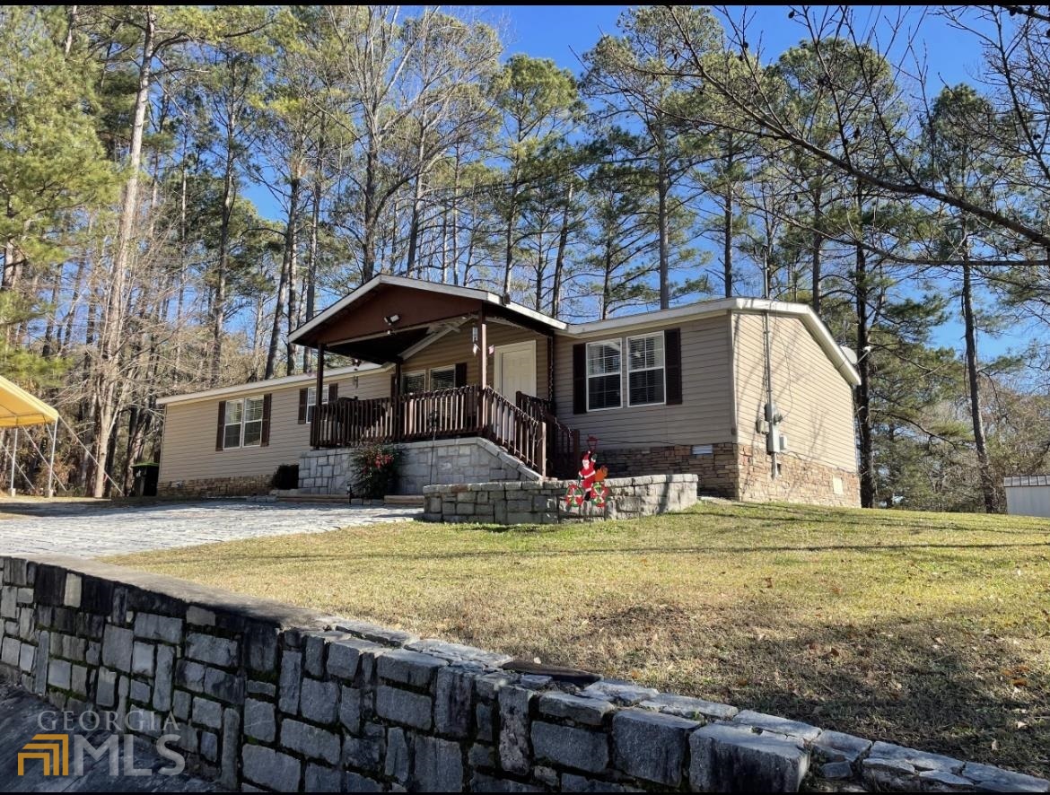 2379 Philadelphia Road Conyers, GA 30012 - Photo 1 of 1 a view of a house with swimming pool