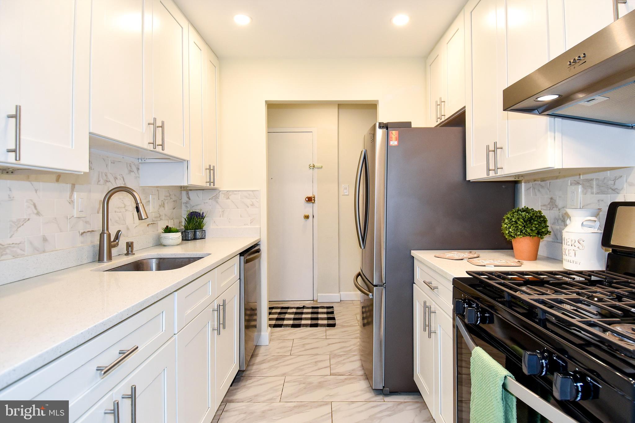 7087 Spring Garden Drive, Unit 102 Springfield, VA 22150 - Photo 4 of 34 Fully Upgraded Kitchen