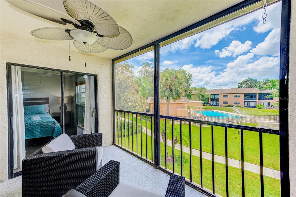 12900 Vonn Road, Unit E205 Largo, FL 33774 - Photo 23 of 35 a view of a porch and furniture