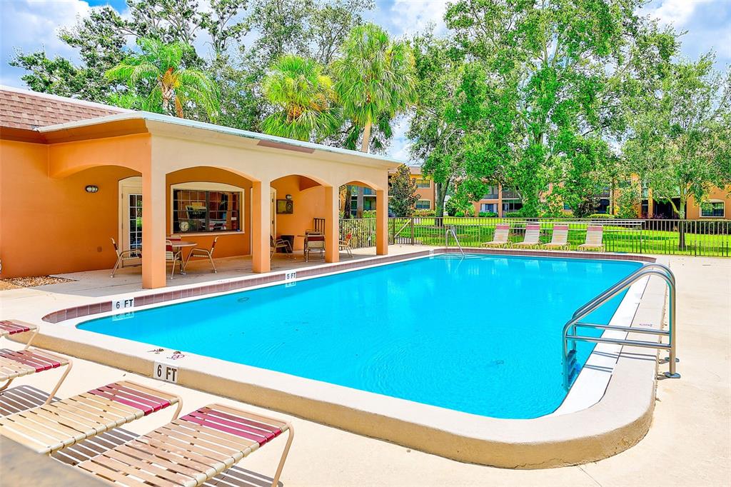 12900 Vonn Road, Unit E205 Largo, FL 33774 - Photo 31 of 35 a view of a pool with a small pool