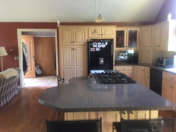 41 Diandy Road Bourne, MA 02562 - Photo 15 of 17 a kitchen with stainless steel appliances granite countertop a sink stove and cabinets