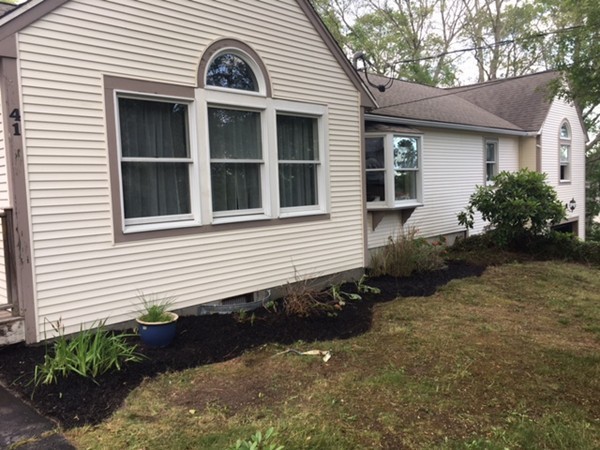 41 Diandy Road Bourne, MA 02562 - Photo 3 of 17 a view of a house with a yard