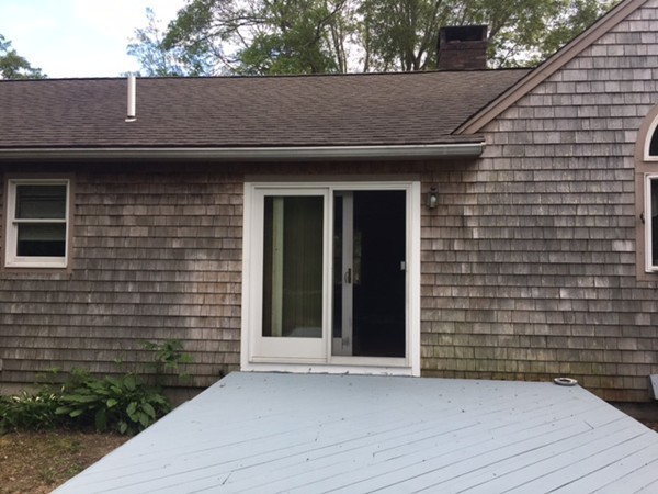 41 Diandy Road Bourne, MA 02562 - Photo 6 of 17 a front view of a house with a garden