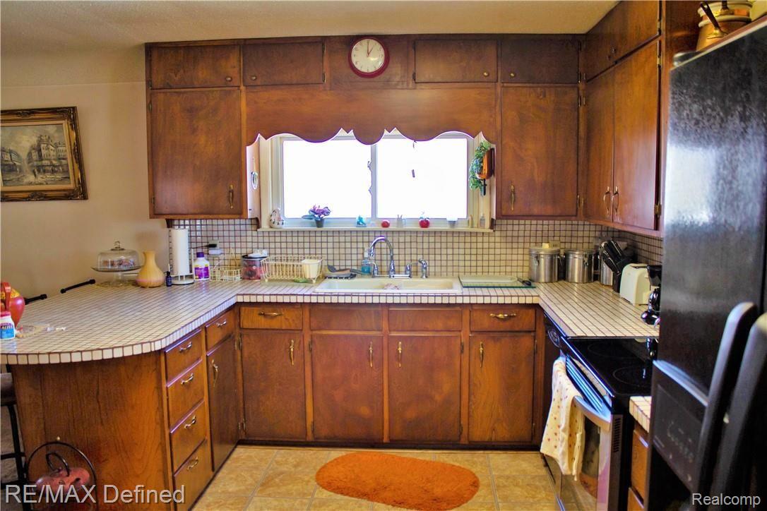 5853 Burdick Road Lapeer, MI 48446 - Photo 6 of 22 Lots of Counter Space and Cabinets