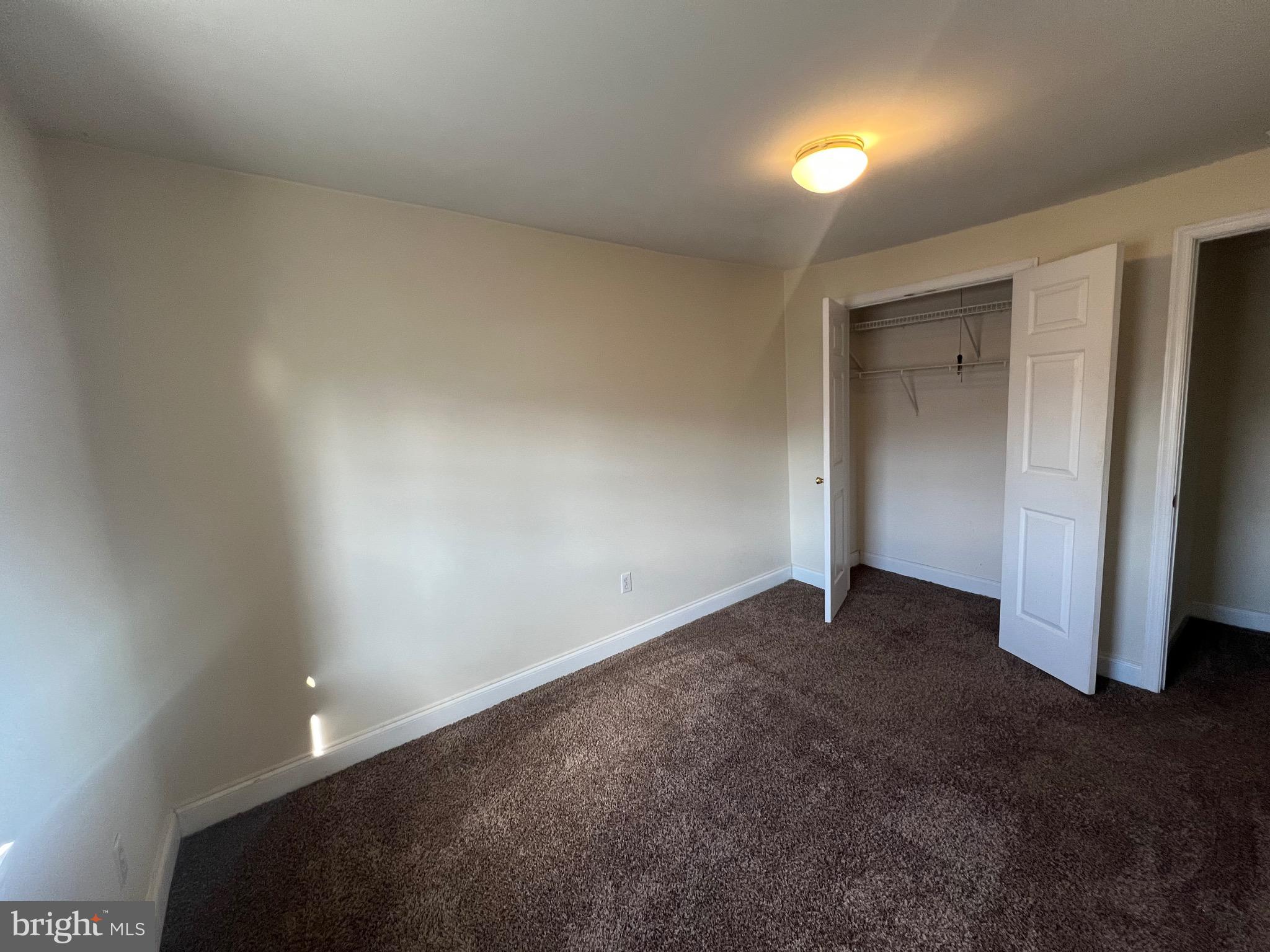 4127 Cresson Street, Unit 2F Philadelphia, PA 19127 - Photo 10 of 14 an empty room with closet area