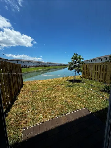 a view of a water from a yard