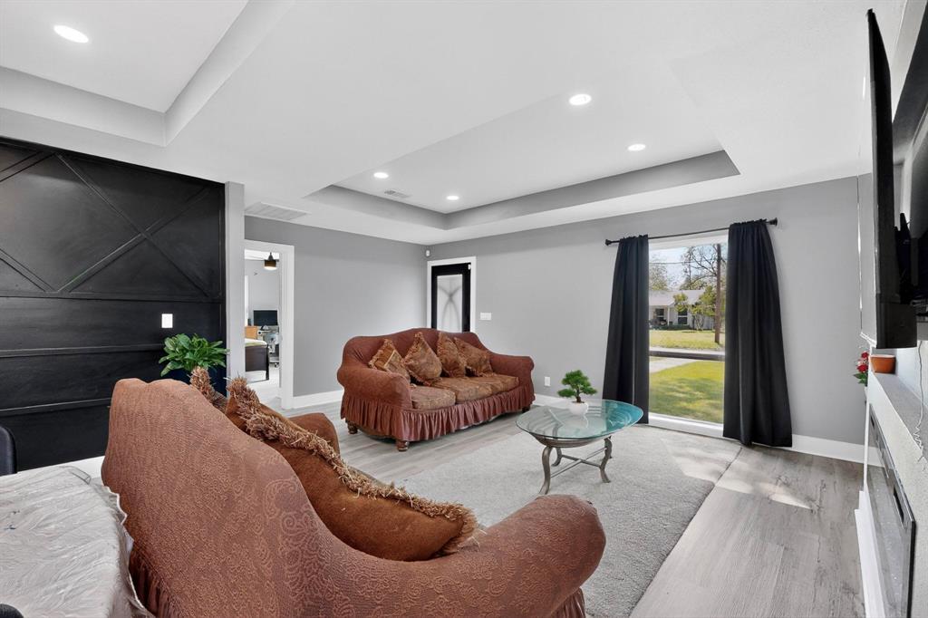 602 North Bagdad Road Grand Prairie, TX 75050 - Photo 13 of 39 a living room with furniture and a window