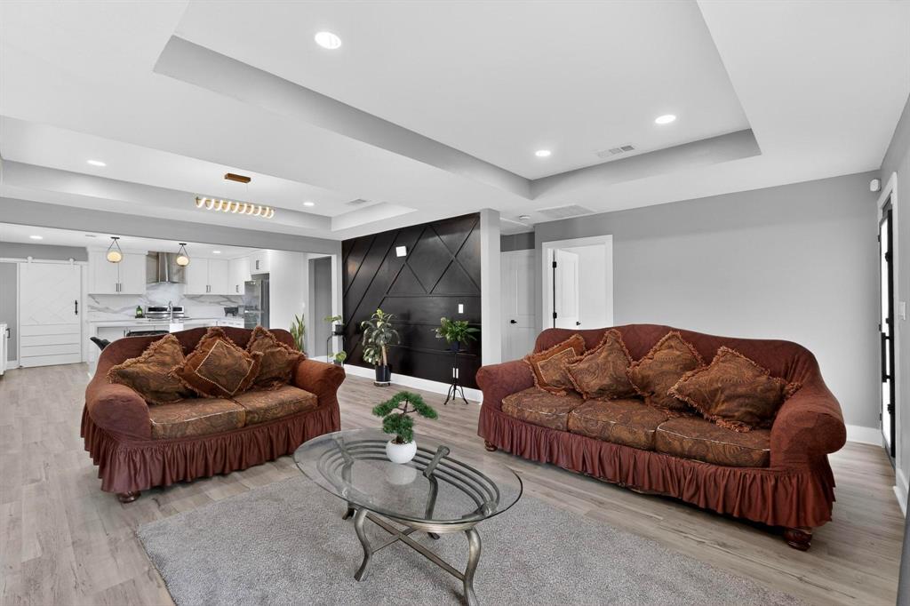 602 North Bagdad Road Grand Prairie, TX 75050 - Photo 14 of 39 a living room with furniture and a couch