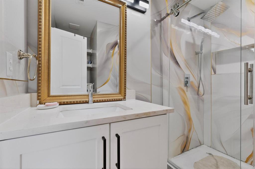 602 North Bagdad Road Grand Prairie, TX 75050 - Photo 23 of 39 a bathroom with a sink a toilet and shower