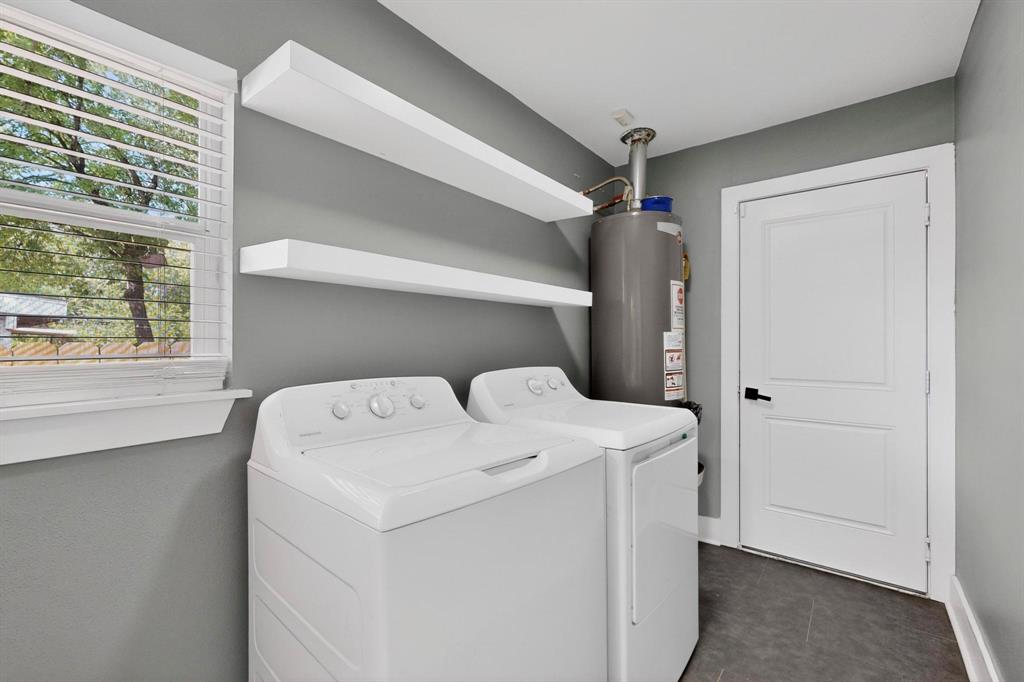 602 North Bagdad Road Grand Prairie, TX 75050 - Photo 30 of 39 a utility room with dryer and washer