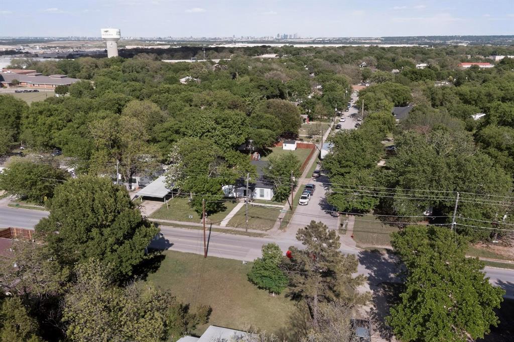602 North Bagdad Road Grand Prairie, TX 75050 - Photo 3 of 39 an aerial view of a houses with a yard