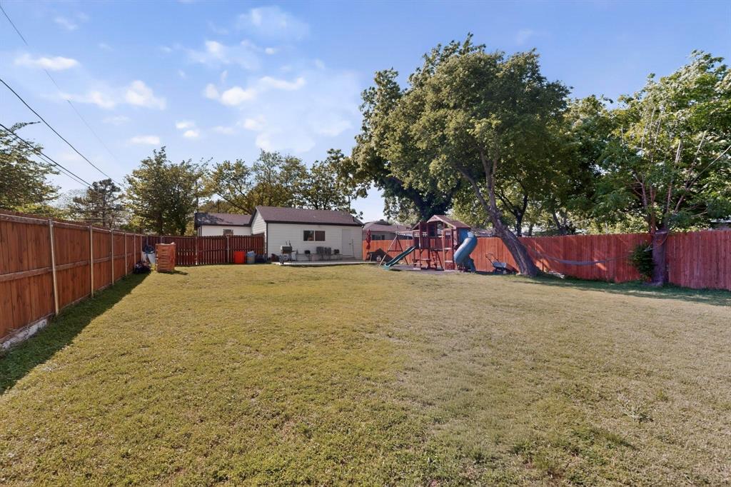 602 North Bagdad Road Grand Prairie, TX 75050 - Photo 34 of 39 a view of an outdoor space and yard